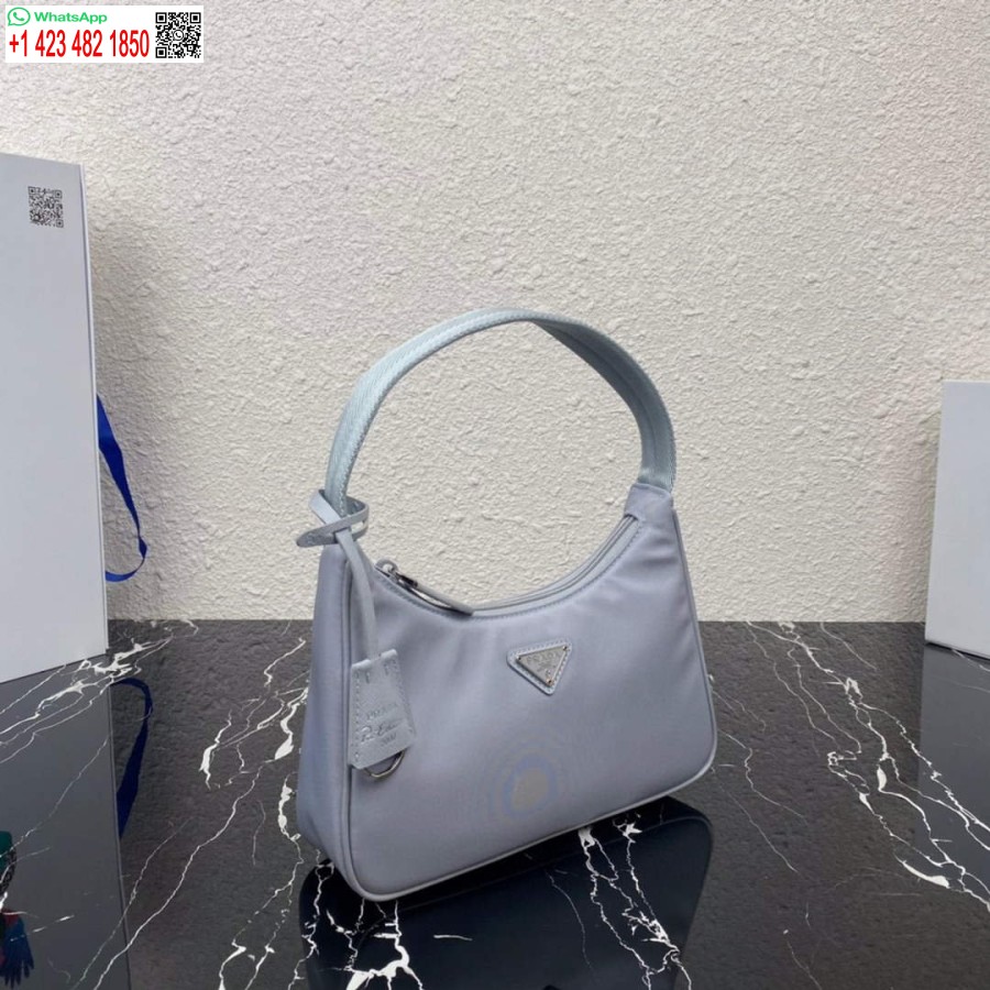 реплика Prada 1ne515 Re-nylon Re-edition 2000 мини-чанта светло синьо